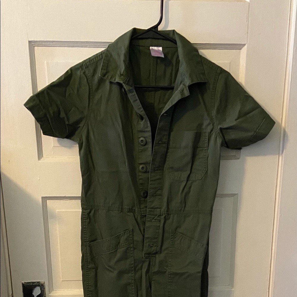 green jumpsuit